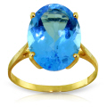 14K. SOLID GOLD RING WITH NATURAL OVAL BLUE TOPAZ